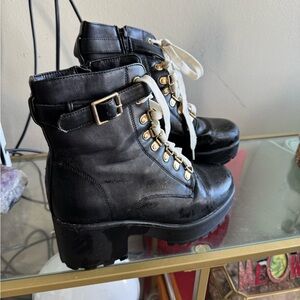 Stylish Black Combat Boots with Gold Accents